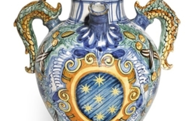 An Italian maiolica armorial two-handled syrup jar, Montelupo, circa 1550