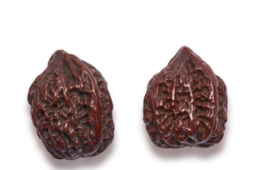 A FINE PAIR OF UNCARVED WALNUTS, QING DYNASTY (1644-1911)