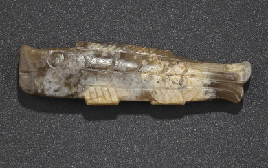 A MOTTLED CARAMEL JADE FISH-FORM PENDANT, LATE SHANG-EARLY WESTERN ZHOU DYNASTY, 12TH-11TH CENTURY BC