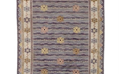 Märta Måås-Fjetterström: “Steninge”. Handwoven “flossa” carpet of wool with polychrome floral pattern. Signed MMF. L. 235 cm. W. 145 cm.