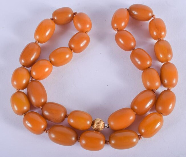 A 1920S SILVER AND AMBER NECKLACE. 100 grams. 62 cm