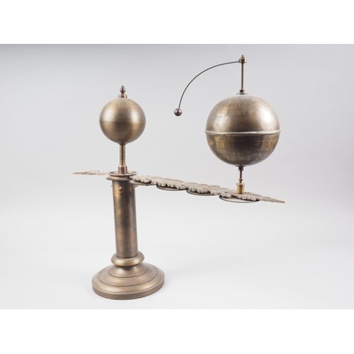 A 1920s Anglo-Indian design patinated brass hand-operated su...