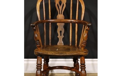 A 19th century ash and elm child’s Windsor rocking chair, pi...