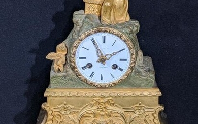 A 19th century ormolu mantel clock, figural surmount, 8