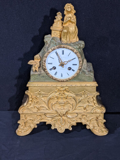 A 19th century ormolu mantel clock, figural surmount, 8...