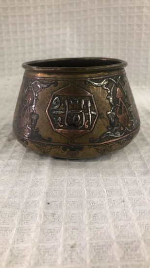 A 7X10 silver damasky copper bowl