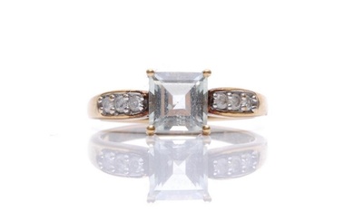 A 9ct hallmarked green amethyst and diamond ring, central sq...