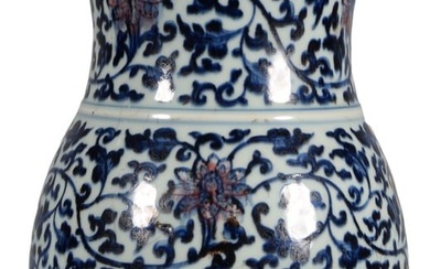 A BLUE AND UNDERGLAZE-RED PEAR-SHAPED VASE