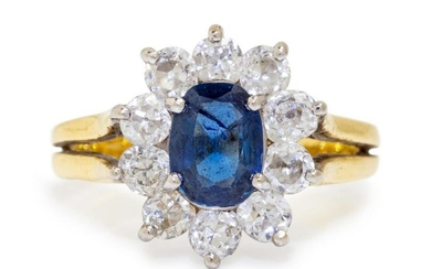 A Bicolor Gold, Sapphire and Diamond Ring