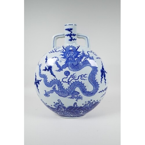 A Chinese blue and white porcelain moon flask decorated with...