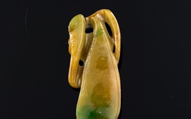 A Chinese carved jadeite bean-form toggle, 19th century