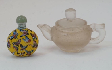A Chinese enamelled Peking glass snuff bottle and a rock crystal teapot, 20th century, the snuff bottle painted with butterflies on a yellow ground, with a gu yue xuan mark to base and a glass stopper, 8cm high including the stopper, the teapot...