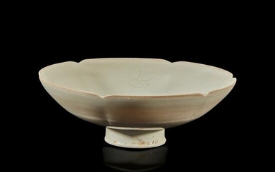 A Chinese lobed Ding ware stem cup