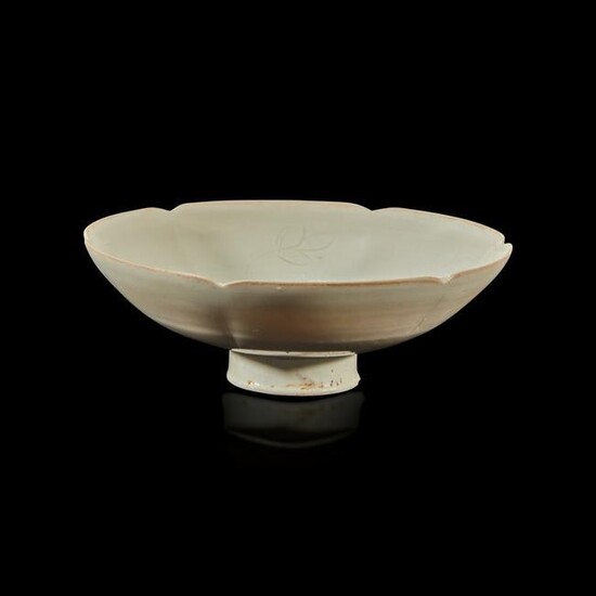 A Chinese lobed Ding ware stem cup