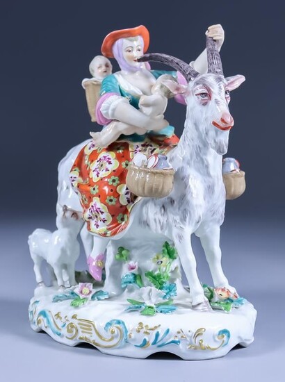 A Continental Porcelain Group - "The Tailor's Wife", 20th...