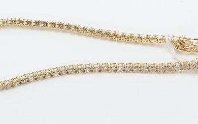 A DIAMOND LINE BRACELET IN 18CT GOLD, TOTAL DIAMOND WEIGHT 4.55CTS, LENGTH 18CMS