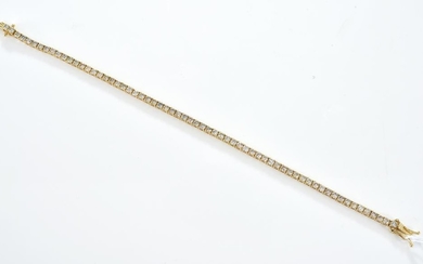 A DIAMOND LINE BRACELET WEIGHING 4.60CTS IN 18CT GOLD