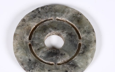 A DOUBLE CONCENTRIC-RING JADE PENDANT "BI".