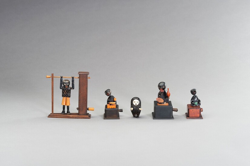 A GROUP OF FIVE AMUSING WOOD KOBE TOYS