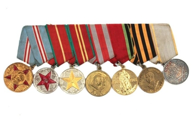 A GROUP OF RUSSIAN SOVIET MEDALS ON SINGLE PLATE