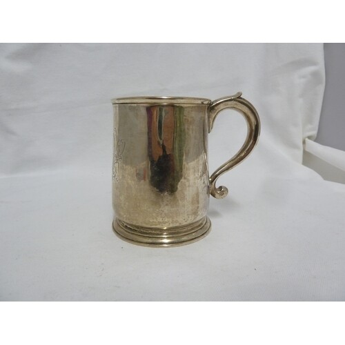 A George I silver mug, of tapering cylindrical form on sprea...