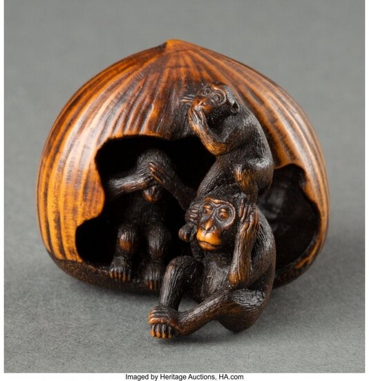 A Japanese Carved Wood Monkeys and Chestnut Nets