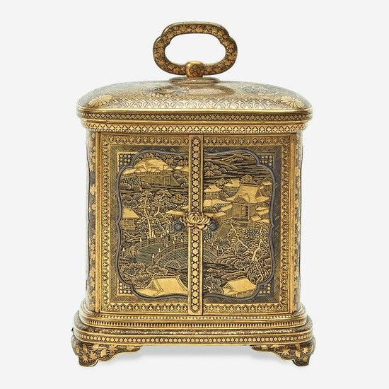 A Japanese gold-inlaid iron miniature cabinet