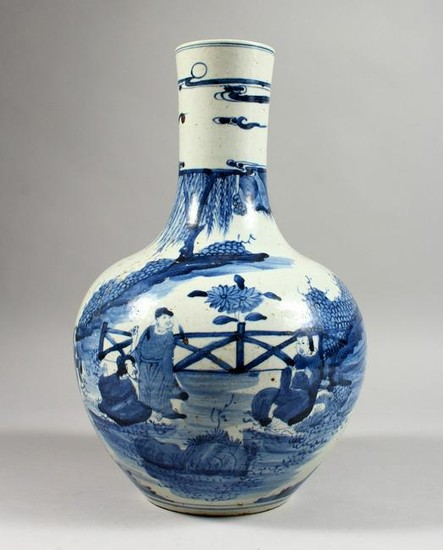 A LARGE CHINESE BLUE AND WHITE BOTTLE VASE. 14ins