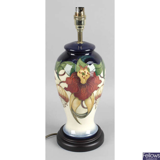 A Moorcroft pottery table lamp, in Anna Lily pattern.