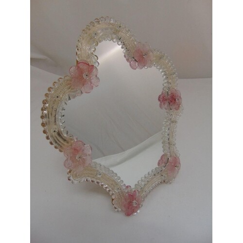 A Murano glass dressing table mirror with applied pink flowe...