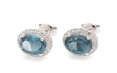 A PAIR OF 10CT WHITE GOLD TOPAZ STUD EARRINGS