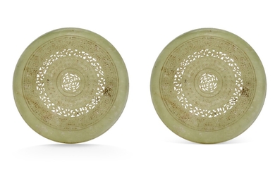 A PAIR OF CHINESE CARVED SERPENTINE CIRCULAR BOXES AND COVERS