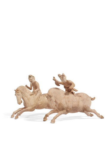 A PAIR OF CHINESE PAINTED POTTERY FIGURES OF FEMALE POLO PLAYERS, TANG DYNASTY (618-907)