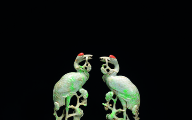 A PAIR OF MOTTLED PALE AND APPLE-GREEN JADEITE MODELS OF CRANES