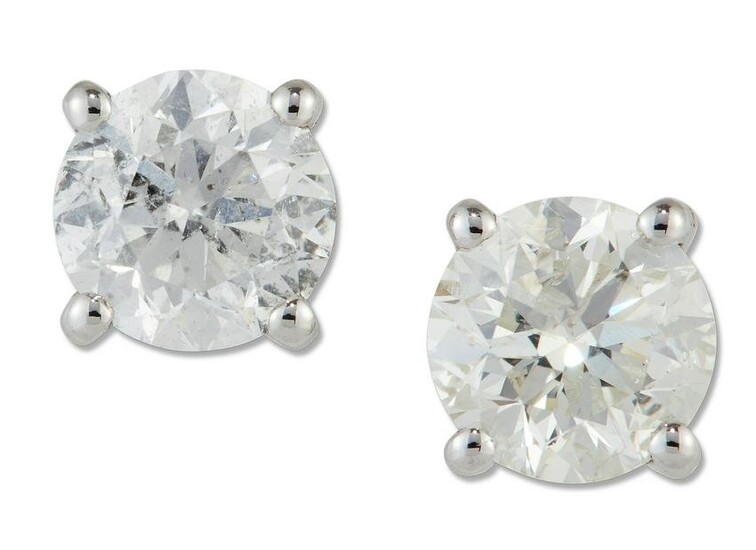 A PAIR OF SOLITAIRE DIAMOND EARRINGS, round