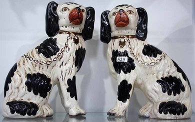 A PAIR OF STAFFORDSHIRE COMFORTER DOGS