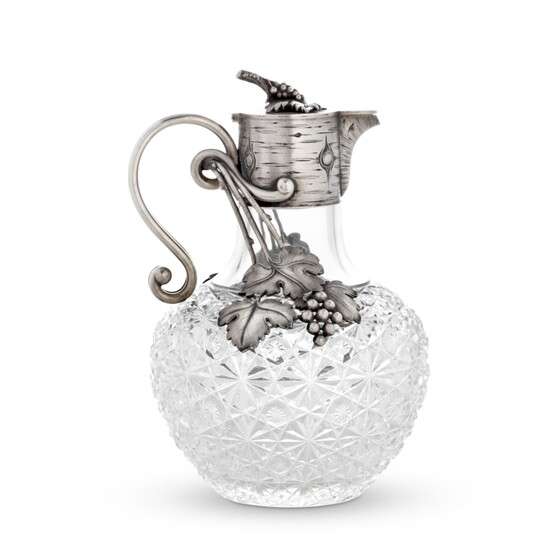 A PARCEL-GILT SILVER-MOUNTED CUT-GLASS DECANTER, MARKED K. FABERGÉ WITH IMPERIAL WARRANT, MOSCOW, CIRCA 1890