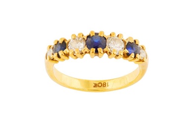 A SEVEN-STONE SAPPHIRE AND DIAMOND RING