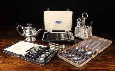 A Silver Mounted Cruet Set, a Small Silver Teapot, Silver Sugar Tongs, and Cased Sets of Silver Teas