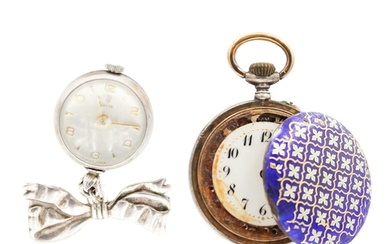A Tudor silver nurses 'ball' watch on a silver ribbon brooch...
