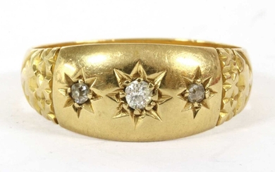 A Victorian 18ct gold three stone diamond ring