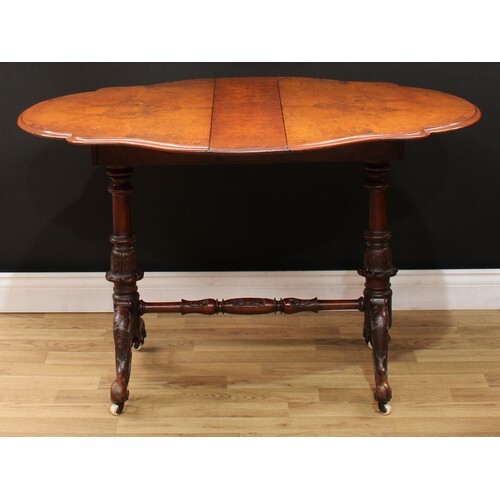 A Victorian burr walnut shaped oval Sutherland table, quarte...