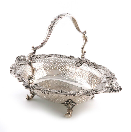 A Victorian silver swing-handled cake basket