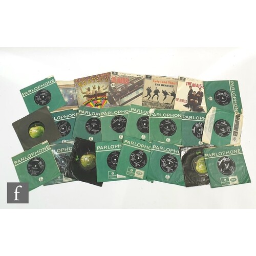 A collection of The Beatles 7 inch singles and EPs to includ...
