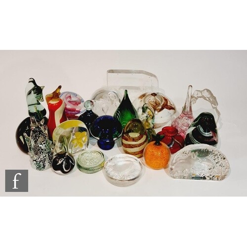 A collection of paperweights of various forms, to include as...