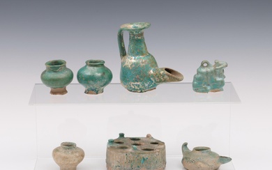 A collection of seven Islamic turquoise glazed ceramics, Middle East, Persia 13th century and later;
