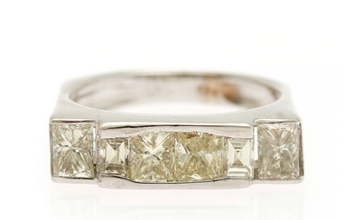 A diamond ring set with two princess-cut, two rectangular princess-cut and two baguette-cut diamonds, totalling app. 2.00 ct., mounted in 14k white gold.