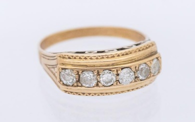 A diamond set six stone gold ring, comprising five diamonds...