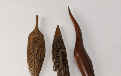 A group of Inuit wood carved letter openers