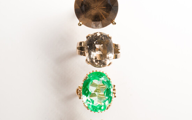 A group of gemstone and fourteen karat white or yellow gold rings